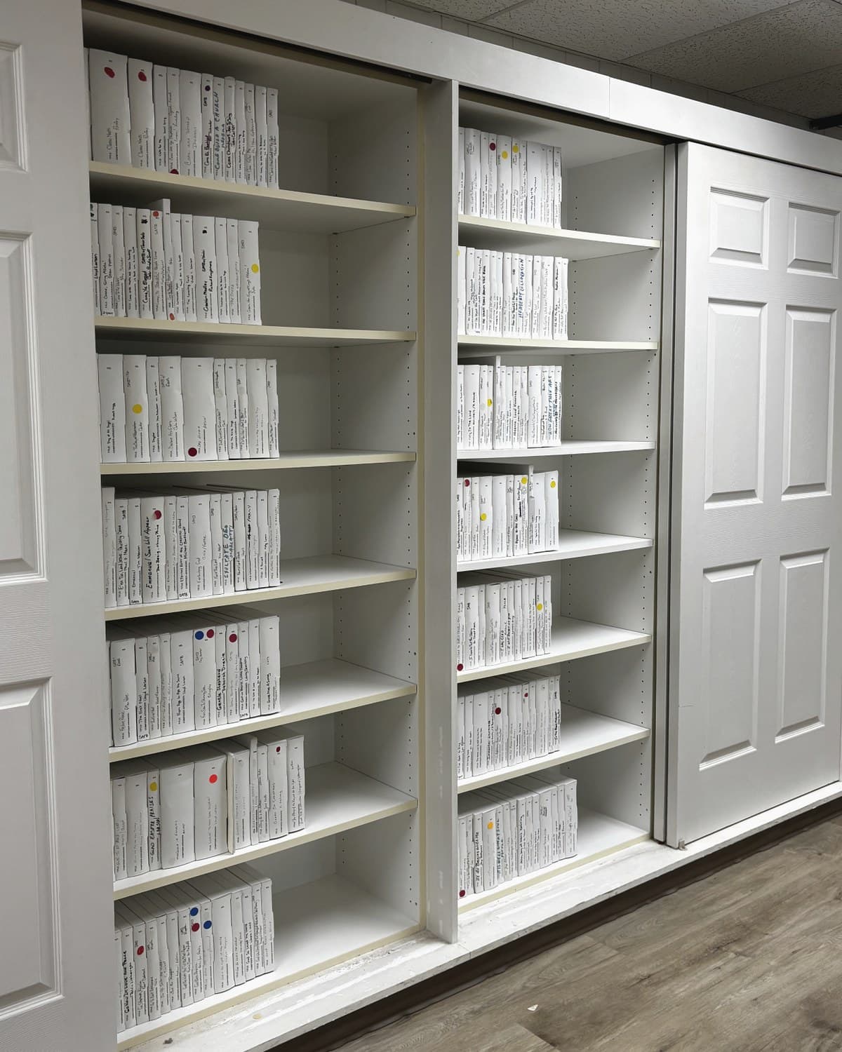 Dover Congregational UCC's organized Chancel Choir music library, with filing boxes arranged across mapped shelving